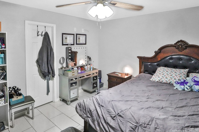 bedroom featuring light tile patterned flooring and ceiling fan