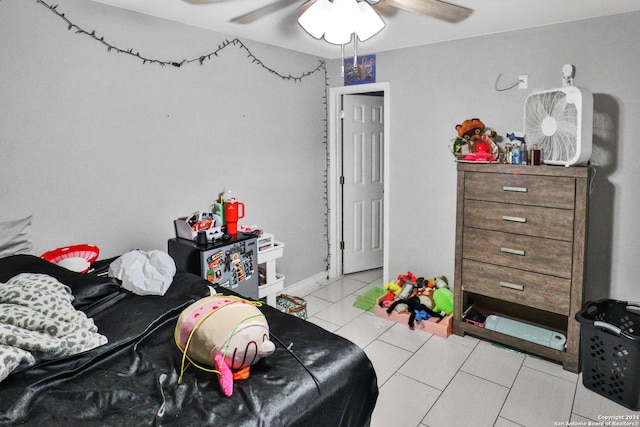 interior space featuring ceiling fan and light tile patterned floors