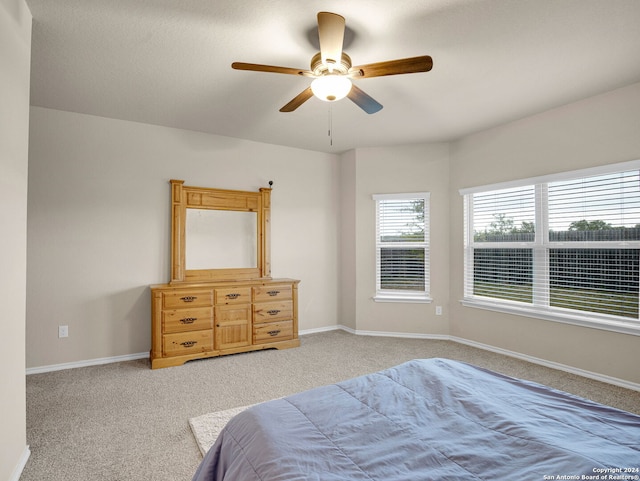 bedroom featuring carpet flooring and ceiling fan