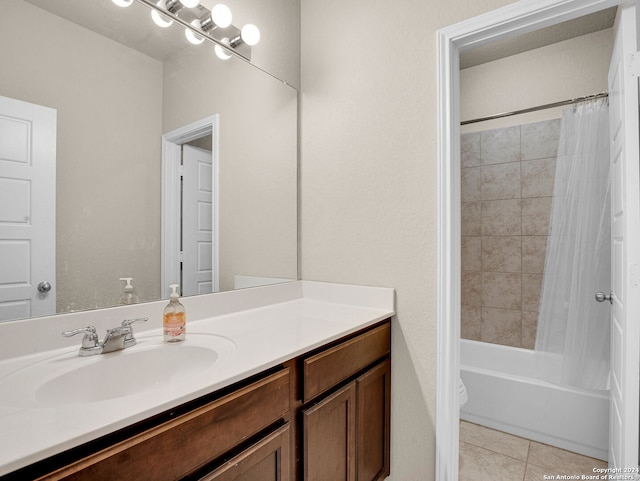 full bathroom featuring vanity, shower / tub combo with curtain, tile patterned floors, and toilet