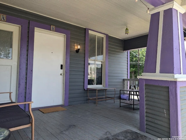 wooden deck with covered porch