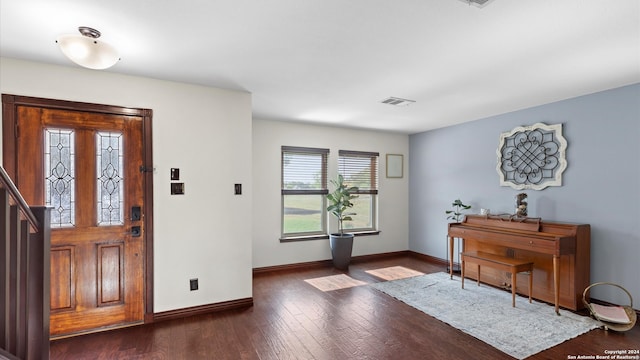 entrance foyer featuring dark hardwood / wood-style flooring