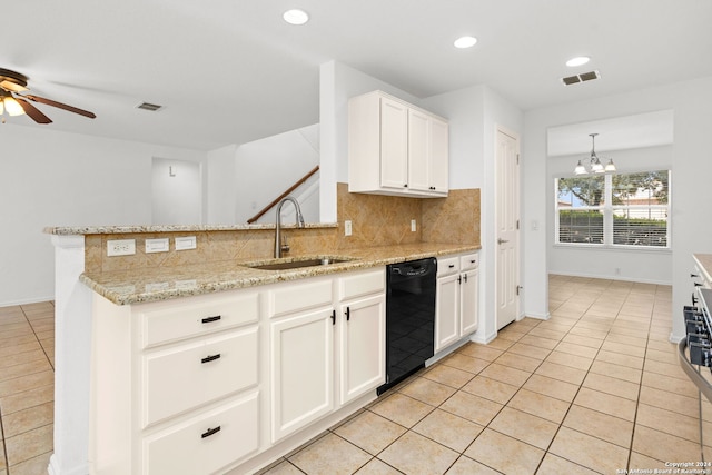 kitchen with black dishwasher, light stone countertops, light tile patterned flooring, sink, and white cabinetry