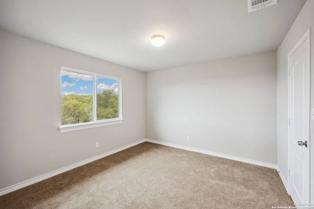 unfurnished room featuring carpet floors