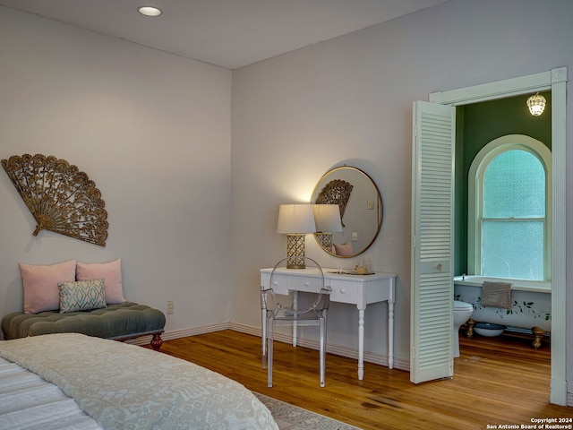 bedroom featuring hardwood / wood-style floors