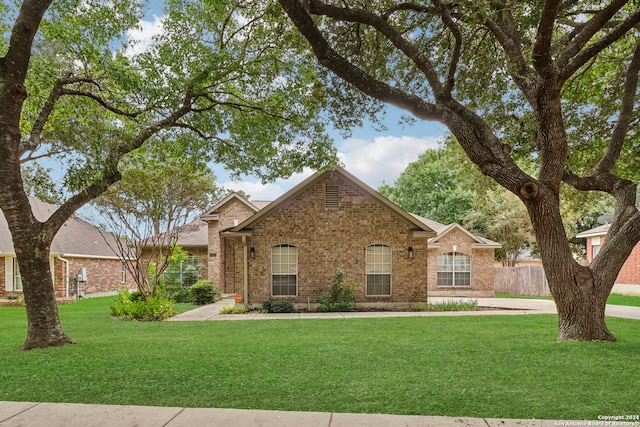 view of front of home with a front yard