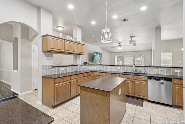 kitchen with decorative backsplash, dishwasher, a sink, visible vents, and a ceiling fan