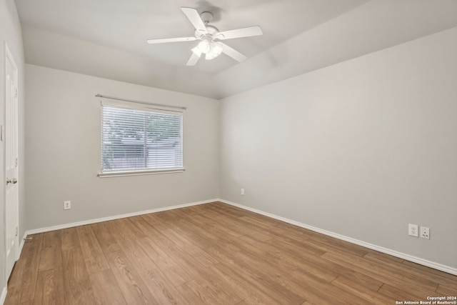 unfurnished room with light hardwood / wood-style floors and ceiling fan