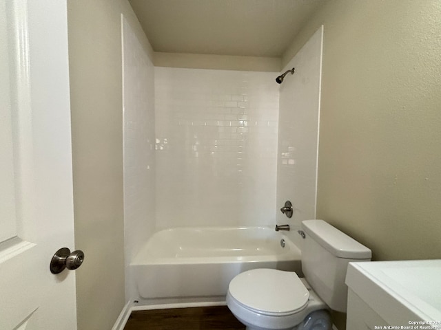 full bathroom with toilet, vanity, and shower / bathtub combination