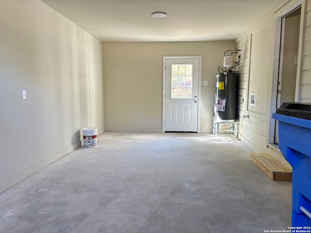 garage with electric water heater