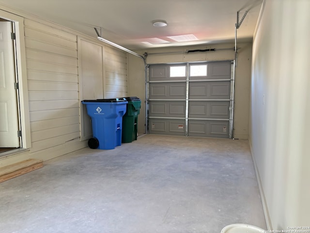 garage with wood walls