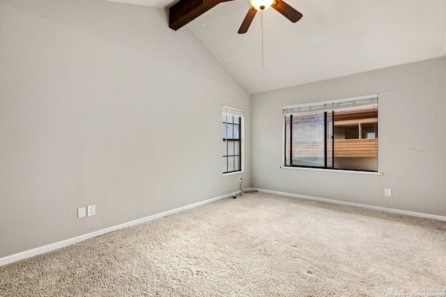 carpeted empty room with lofted ceiling with beams and ceiling fan