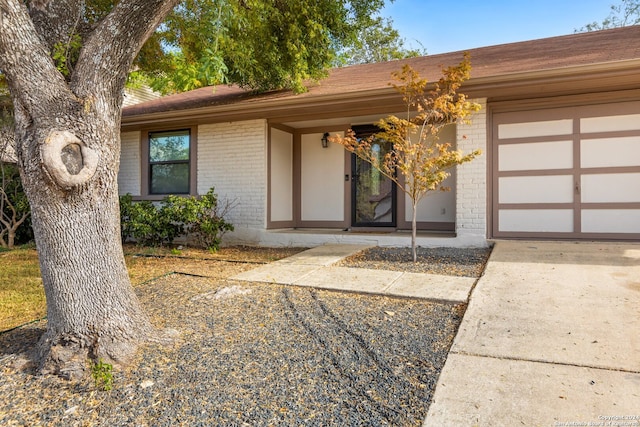 property entrance with a garage