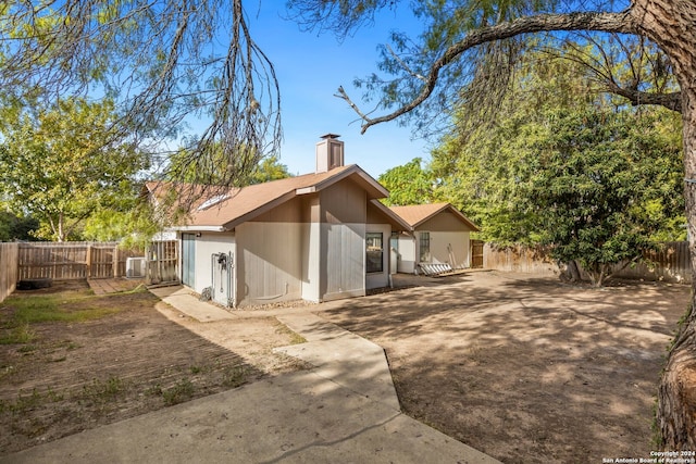 rear view of property with a patio area