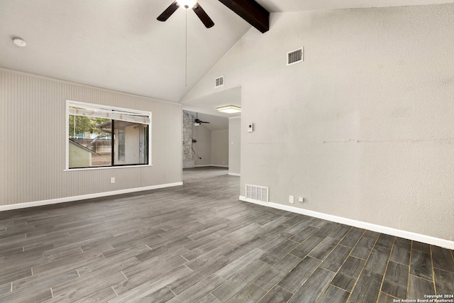 unfurnished room with lofted ceiling with beams, dark hardwood / wood-style floors, and ceiling fan