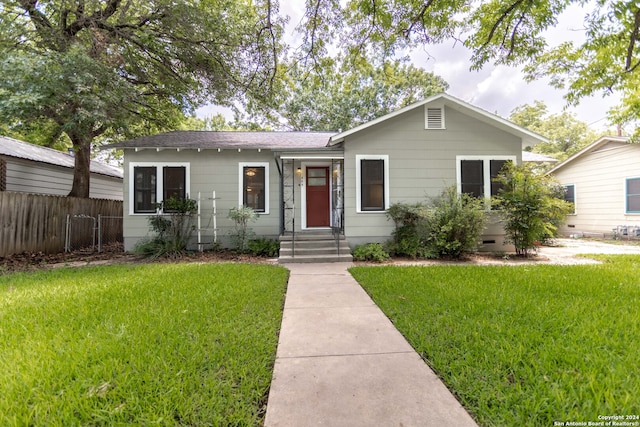 view of front of home with a front yard