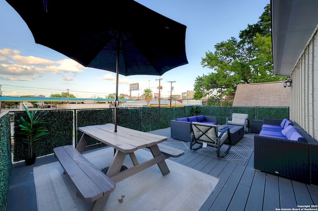 deck with an outdoor hangout area