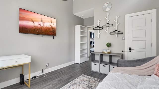 bedroom featuring dark hardwood / wood-style flooring