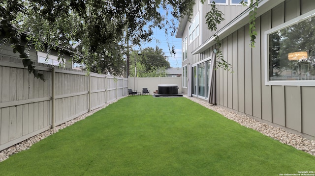 view of yard with central AC unit