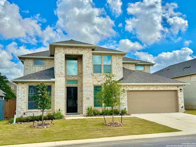 prairie-style house featuring a front yard