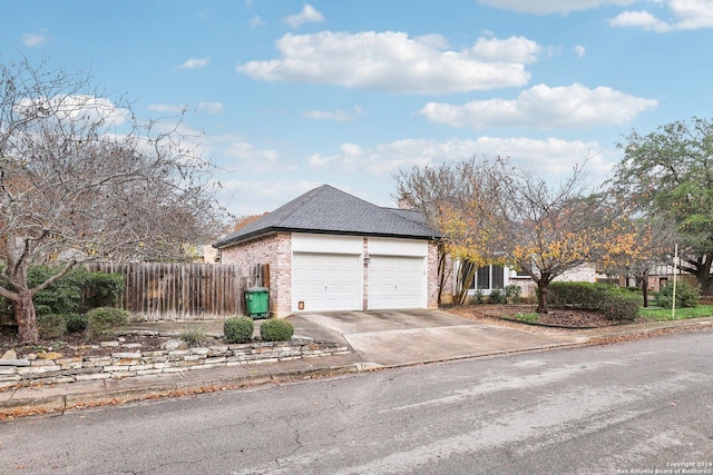 view of property exterior featuring a garage