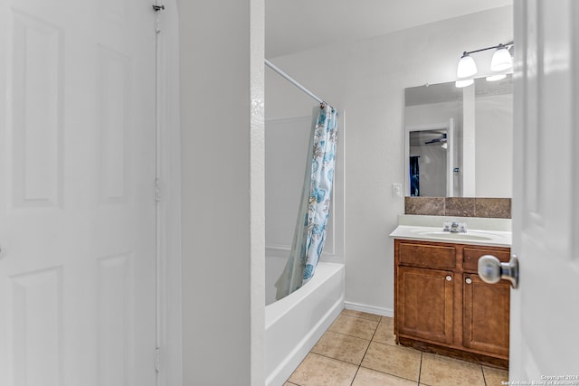 bathroom with vanity, shower / bath combination with curtain, and tile patterned floors