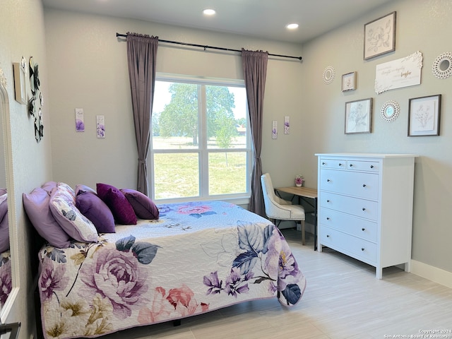 bedroom featuring light wood-type flooring