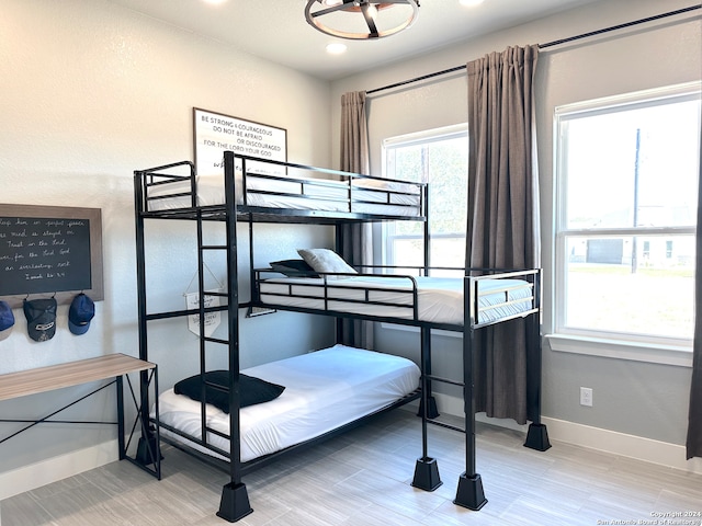 bedroom featuring wood-type flooring