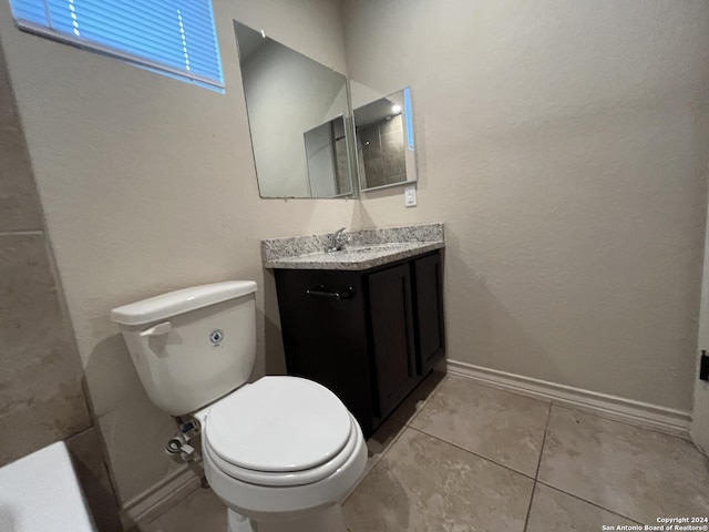6607 Mia Way, San Antonio, TX 78233 - bathroom featuring tile patterned flooring, toilet, vanity, and baseboards