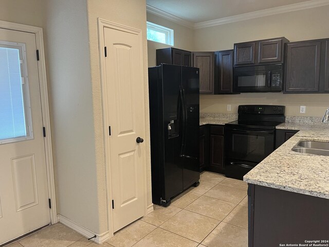 6607 Mia Way, San Antonio, TX 78233 - kitchen with black appliances, a sink, light tile patterned floors, ornamental molding, and light stone countertops