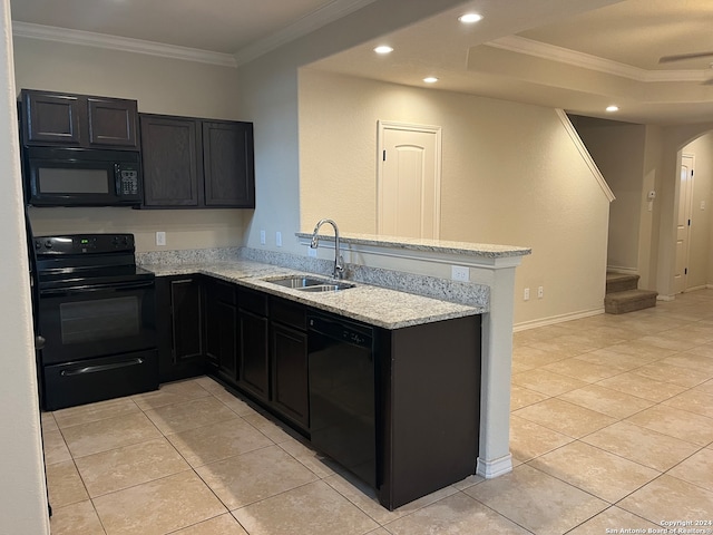 kitchen featuring light stone countertops, black appliances, sink, kitchen peninsula, and ornamental molding