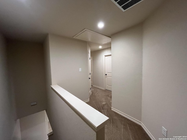 6607 Mia Way, San Antonio, TX 78233 - corridor featuring attic access, an upstairs landing, dark colored carpet, recessed lighting, and baseboards