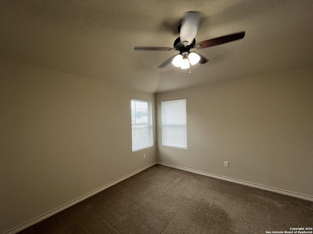 6607 Mia Way, San Antonio, TX 78233 - unfurnished room featuring a ceiling fan, dark carpet, and baseboards