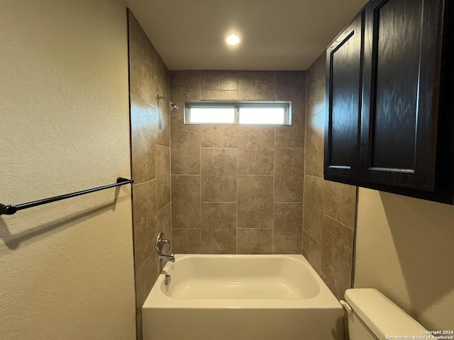 6607 Mia Way, San Antonio, TX 78233 - bathroom featuring toilet, shower / bath combination, and a textured wall