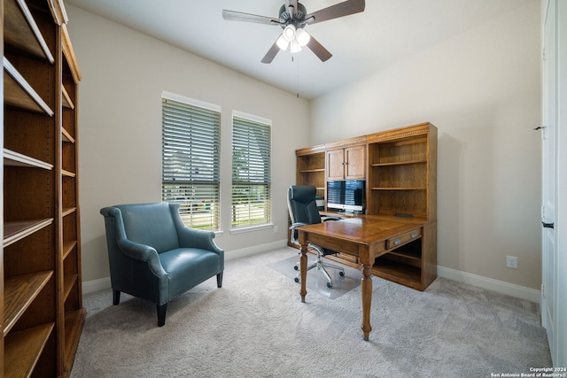 office featuring light carpet and ceiling fan