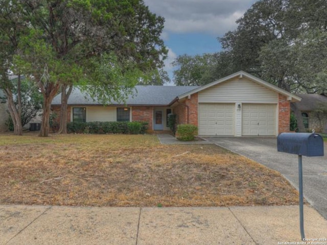 ranch-style home with a garage