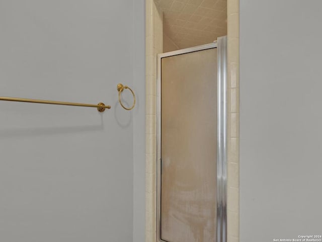 bathroom with an enclosed shower