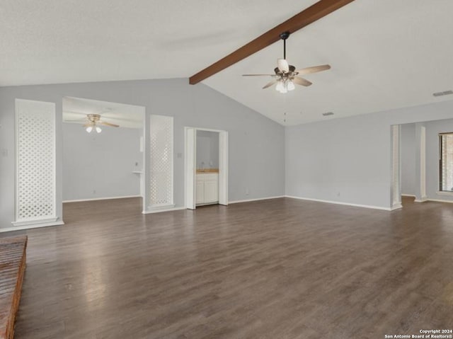 unfurnished living room with vaulted ceiling with beams, ceiling fan, and dark hardwood / wood-style flooring