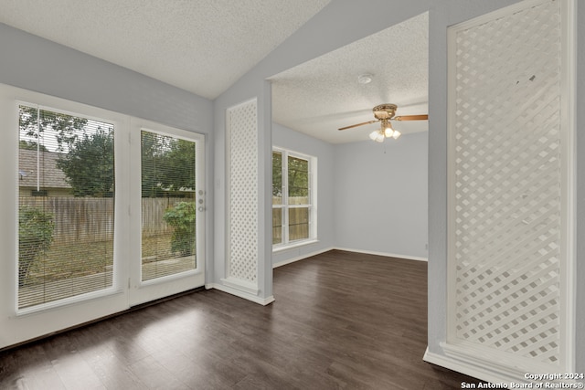 interior space with ceiling fan and vaulted ceiling