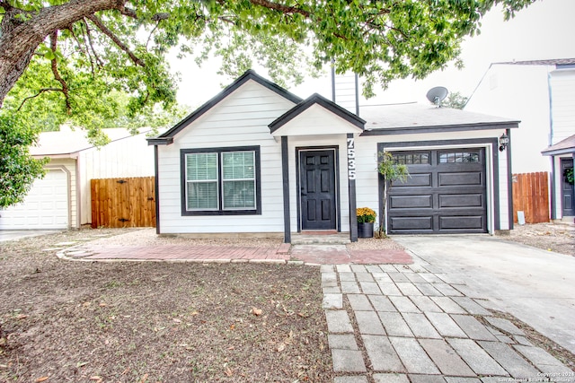 view of front of property featuring a garage