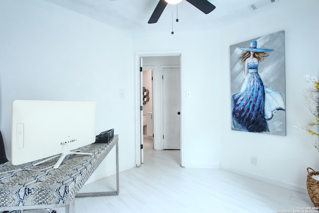 office area with ceiling fan and light wood-type flooring