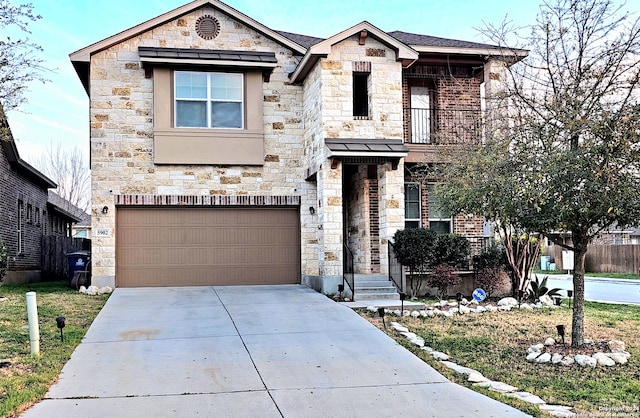 view of front of home with a balcony and a garage