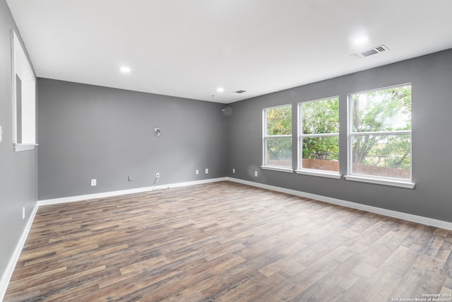 empty room featuring hardwood / wood-style floors