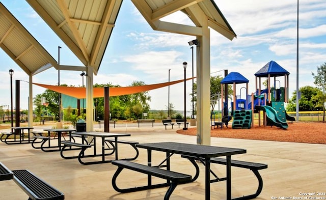 view of home's community featuring a playground