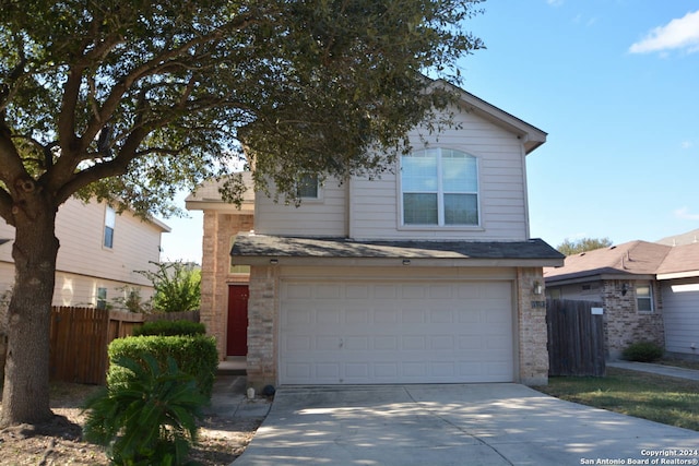 front of property featuring a garage