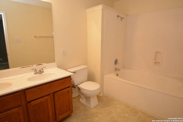 full bathroom with toilet, vanity, and  shower combination