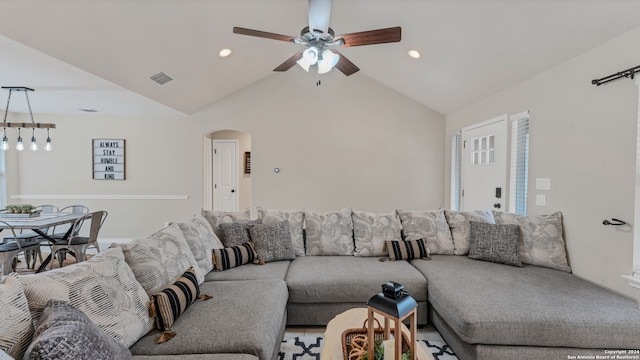 living room with vaulted ceiling and ceiling fan