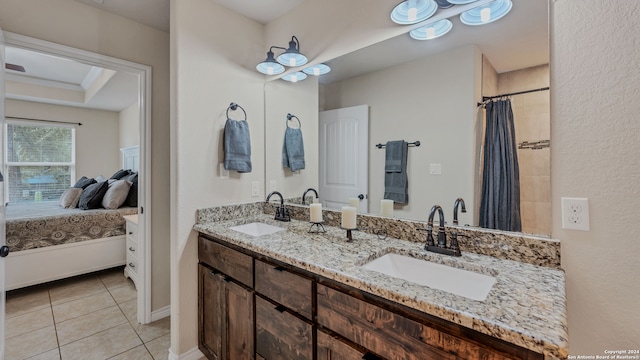 bathroom with vanity and tile patterned flooring