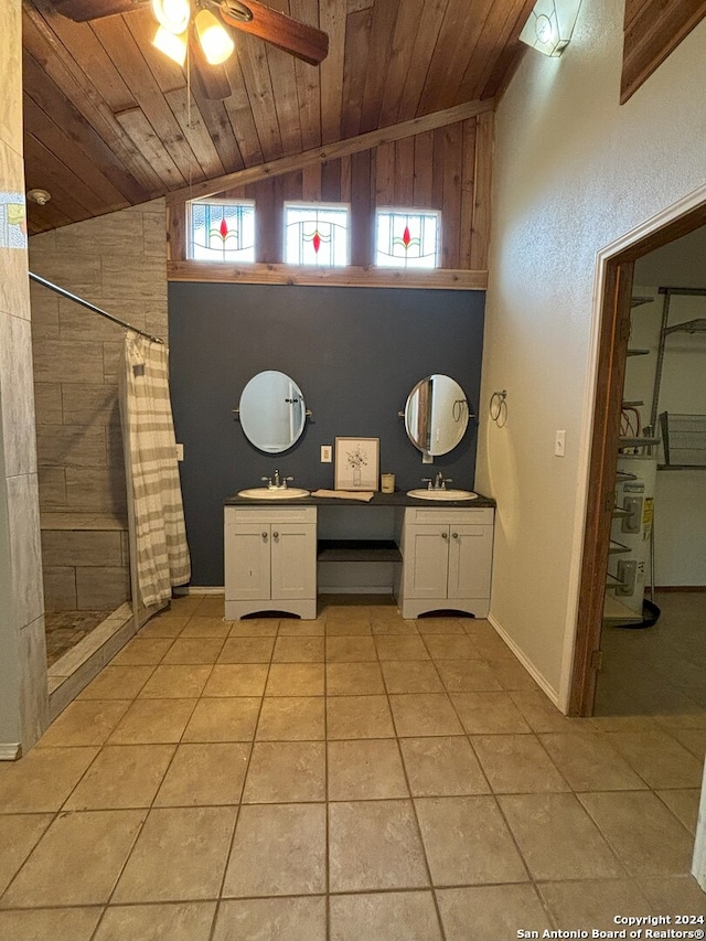 full bath featuring vanity, tile patterned flooring, wooden ceiling, a ceiling fan, and a tile shower