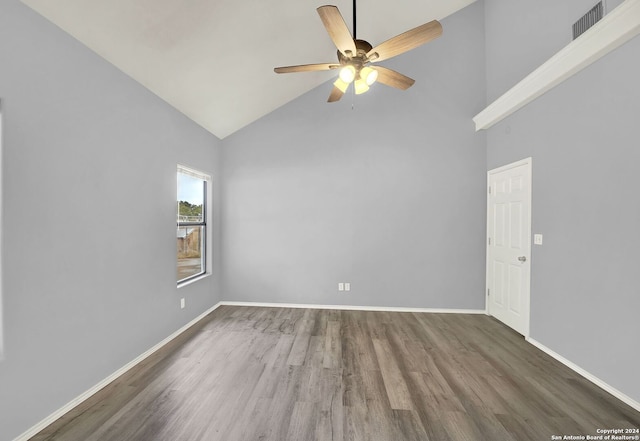 unfurnished room with ceiling fan, high vaulted ceiling, and dark hardwood / wood-style flooring